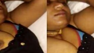 Desi wife sleeps but man takes camera to film her natural titties