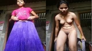 Desi babe records her nude selfies in a rustic setting