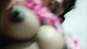 Horny Indian girl pleasures herself in bed
