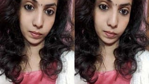 A South Indian girl flaunts her breasts and pussy