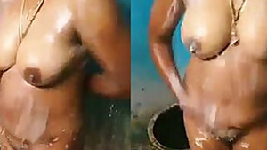 Indian woman prepares for sex by washing XXX curves in the bathroom