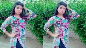 A stunning girl enjoys herself with a toy