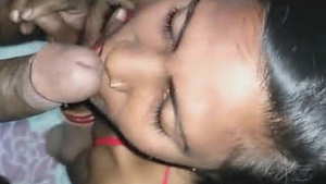 Desi wife teases her lover's cock with her hands and mouth