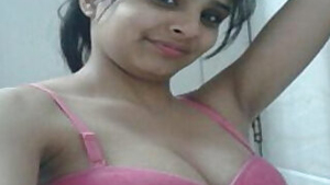 Desi indian girl goes to the bathroom to expose her XXX boobies and pussy