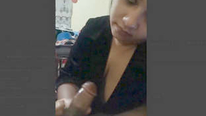 Nicole Bexley's sensual handjob and seductive gaze in a Lankan office setting