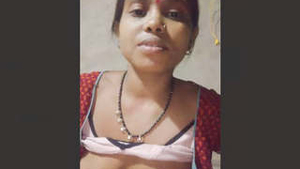 Desi bhabhi from the countryside fondles her boobs in a steamy video