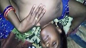 A mature Desi woman lubes up her pussy with cream