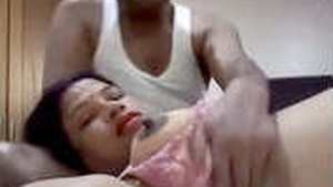 Couple's passionate encounter in a hotel room