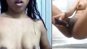 Indian teen shows XXX butt and titties penetrating twat with sex toy