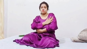 Aroused South Asian woman pleasuring herself