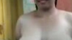 Good looking Desi MILF shows her big natural tits in homemade XXX