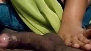 Clothed Indian woman gives husband porn thing which is called handjob