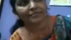 Tamil auntie teases in solo video call by removing panties