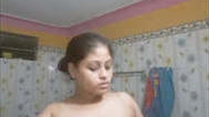 Bhabhi proudly displays her large breasts as she smokes