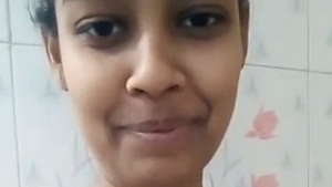 Nude Indian girl takes solo naked selfies without bra