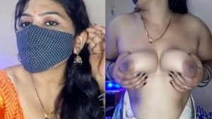 Indian woman with big breasts performs a sensual erotic show
