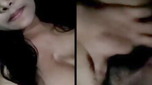 Loves Indian girl with amazing XXX melons takes them to light in sex show
